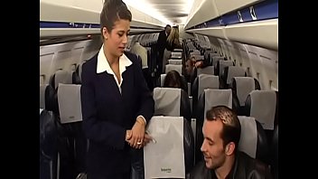 Sexy flight attendant Alyson Ray takes  passenger’s hard cock in her perfect ass swallows a lot of his cum after the flight